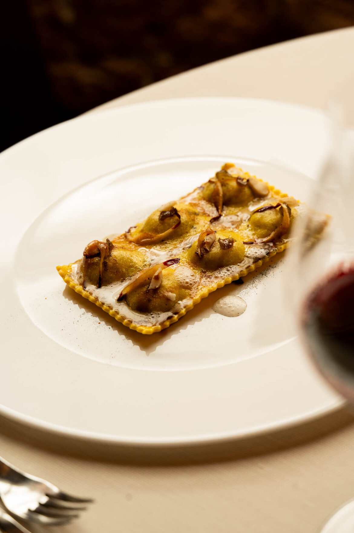 raviolo di radicchio, mosto d’uva, chinotto, noce brasiliana8